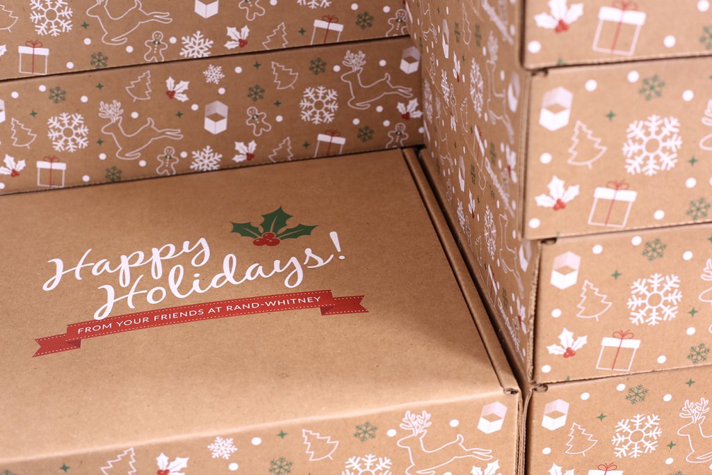 happy holidays packages with reindeers, mistletoe, snowflakes and other christmas themed elements