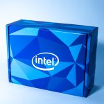 blue mailer box with the text "intel" on it and a geometric shape design