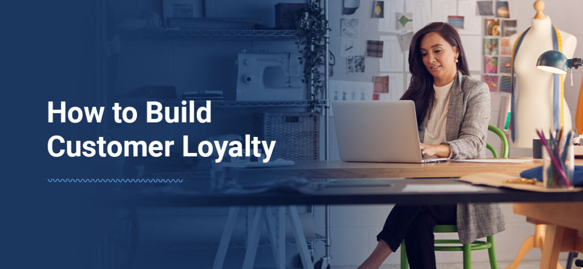 a background with a person working behind a computer with the text "how to build customer loyalty" next to it