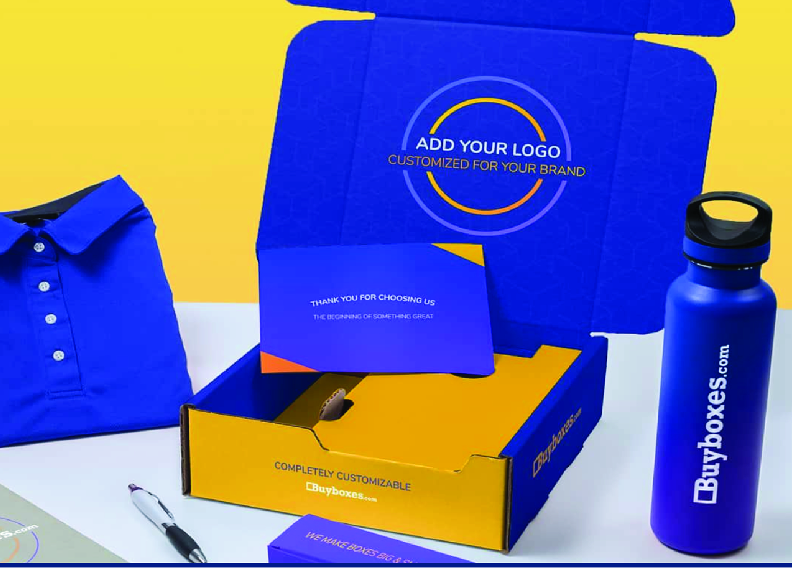 blue and yellow employee welcome box with a blue t-shirt and water bottle on each side